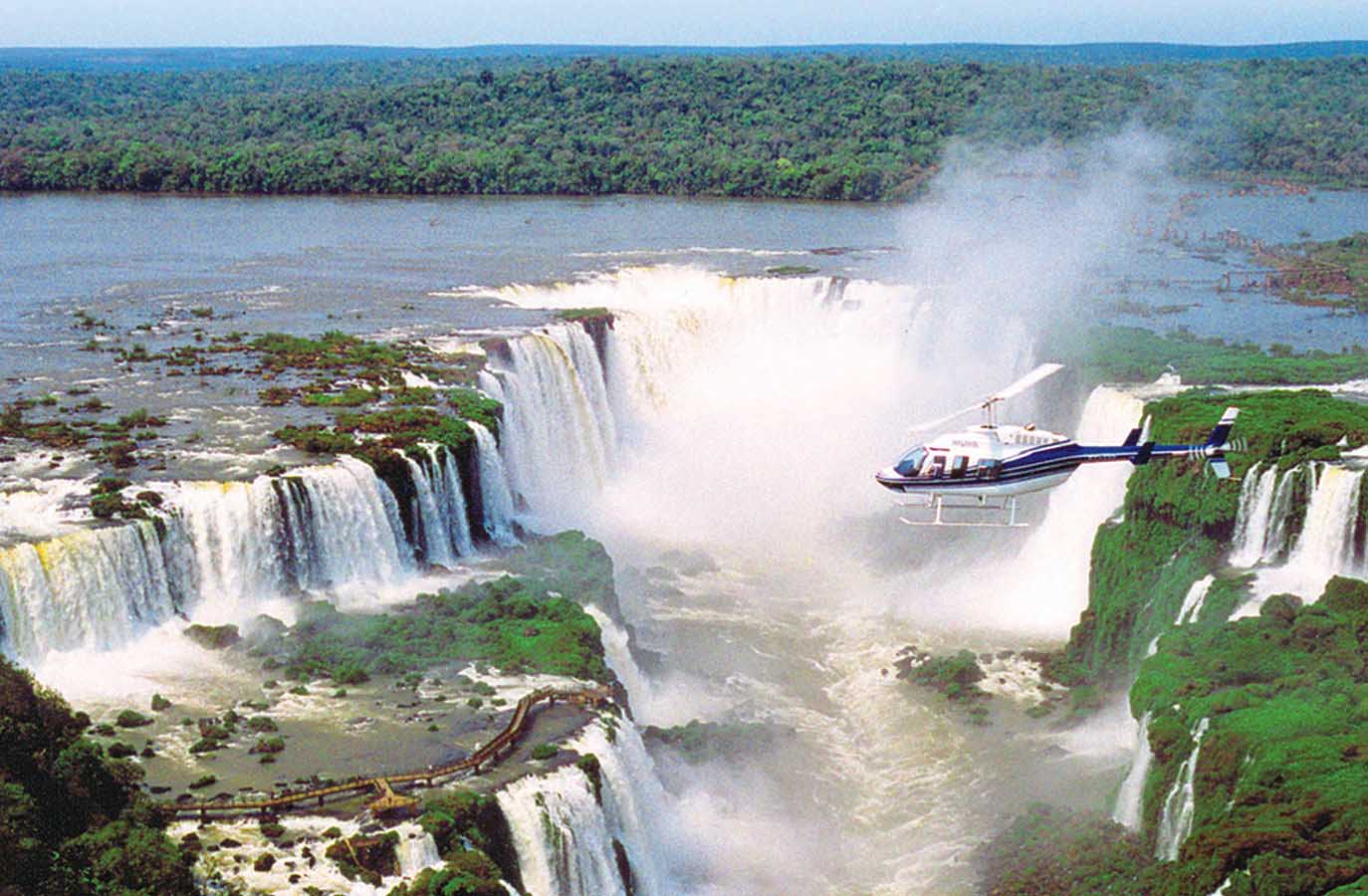 Witness the majestic beauty of the Iguazu Falls from a stunning bird’s-eye view