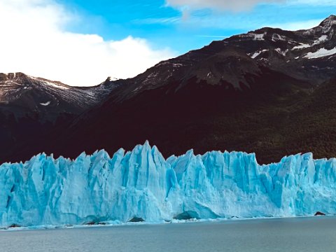 Towering ice walls glow blue at Perito Moreno Glacier